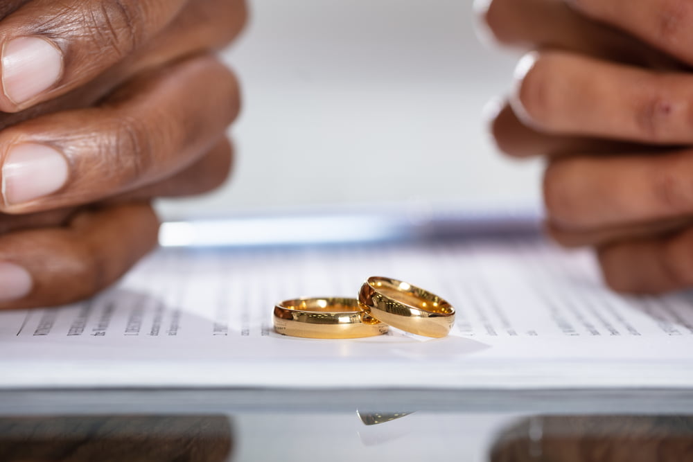 Couple Hands On Divorce Agreement